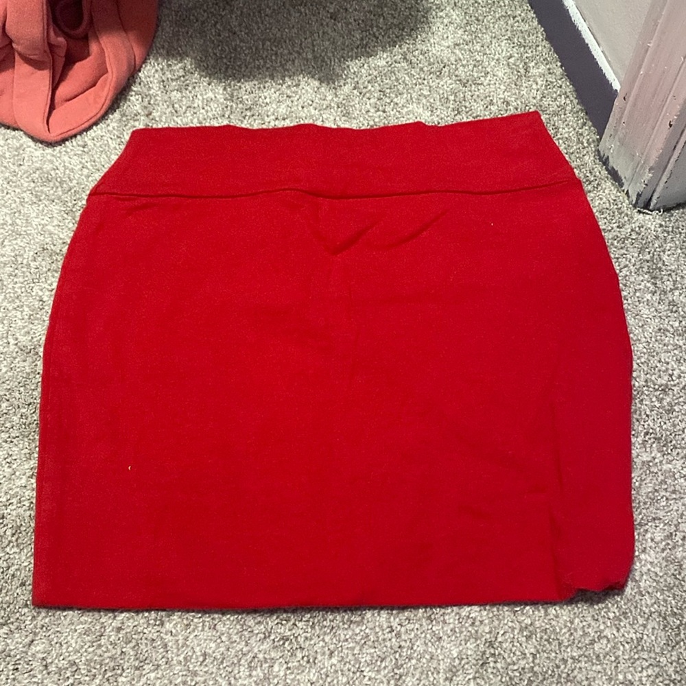 Tight red mini skirt